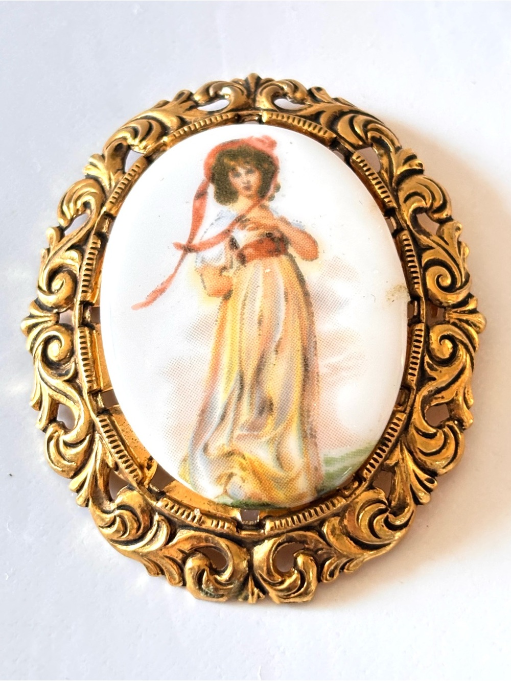 Vintage pastoral ceramic portrait brooch